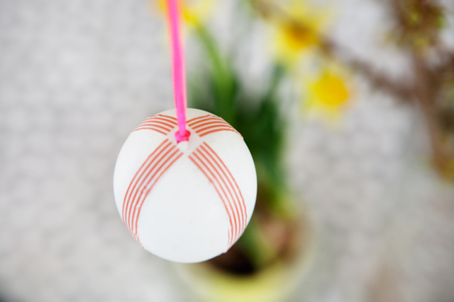Blown out Easter Eggs decorated with colorful masking tape