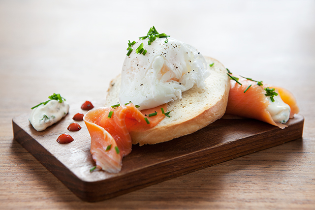 Weekend Breakfast - Toasted Bagel, Smoked Trout, Herb Cream Cheese and Poached Egg. Modern Wifestyle