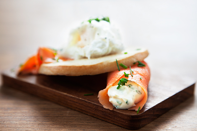 Weekend Breakfast - Toasted Bagel, Smoked Trout, Herb Cream Cheese and Poached Egg. Modern Wifestyle